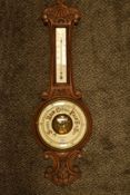 An aneroid and mercury barometer having enamel face dial