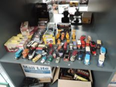 A shelf of mixed vintage diecasts including Lesney, Husky, Trackside, Oxford etc, mainly modern,