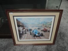 A framed and glazed print after Kevin Walsh, Back In The Race Brooklands 1935, bearing signature,