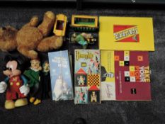 A shelf of mixed Toys & Games including Mastermind x3, Take Your Pick, Woodpecker Vegas, early