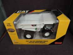 A Norscot Limited Edition 1:50 scale diecast, Cat 795F Off-Highway Truck Special White Edition