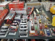 A collection of mixed vintage Majorette diecasts all in blister packs or boxes, approx 50