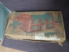 A Mettoy Playthings Metal Dolls House, complete with furniture for every room, in original box,