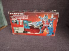 An original 1980's Hasbro Transformer, City Commander Ultra Magnuswith, in original polystyrene
