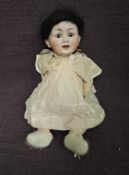 An early 20th century German Catterfelder Puppenfabrik bisque headed Doll stamped C.P 208/38
