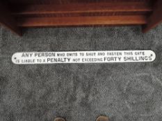 A cast metal Railway Sign, Any Person Who Omits To Shut And Fasten This Gate Is Liable To A