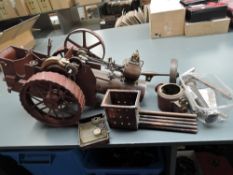 A part hand built Live Steam Traction Engine having 20cm diameter rear wheels, single piston