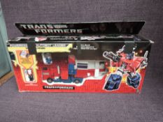 An original 1980's Hasbro Transformer, Powermaster Autobot Leader Optimus Prime with instruction
