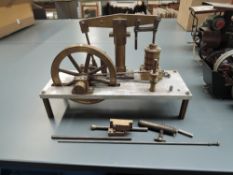 A part made brass Live Steam Beam Engine having single spoke wheel vertical piston, 15cm beam, on