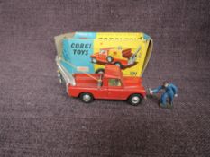 A Corgi diecast, Land-Rover Breakdown Truck, missing canopy, along with a plastic Mechanic figure,