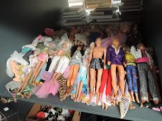 A shelf of modern Sindy, Ken, Auction Men and similar Dolls along with clothing and accessories,
