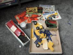 A smal collection of vintage Meccano including clockwork Motor, Parts and Booklets