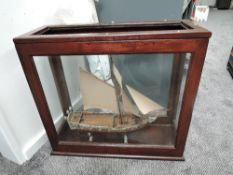 A hand made scale wooden model, Sail Boat on stand in wooden and glazed case, top piece of glass
