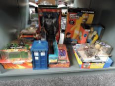 A shelf of modern collecatbles including Doctor Who, Simpsons, Harry Potter, mostly boxed