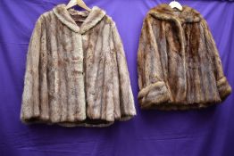 Two shorter length fur coats, around 1950s, one possibly dyed Coney having a pinkish tone the