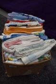 A collection of vintage novelty tea and tray cloths, some lovely cheerful designs.