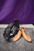 A pair of Edwardian black leather side button boots, marked to underside 6 1/2, appear to be true to