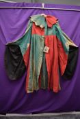 A red and green Heavy cotton jesters costume, worn by Dennis Noble in 'Rigoletto' by Verdi at Covent