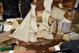 A wooden model of a sailing galleon or ship