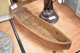 A treen wood carved boat