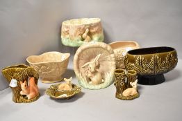 A good collection of mid centruy Sylvac vases, planters and similar.