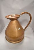 A 19th century copper 2 gallon measure, marked 2 Gallons with stamp