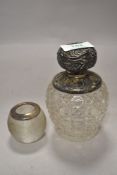 Antique perfume of scent bottle having HM silver chase work lid with similar match striker