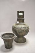 A Chinese or Japanese vase possibly late Qing dynasty having double panels of birds in cherry