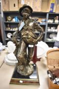 An Academy cold cast bronze figurine.