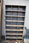 A 20th century metal cased industrial or garage shelf set