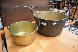 Two vintage brass jam pans.