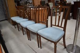 A set of reproduction dining chairs