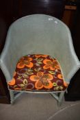 A 20th century woven fibre tub chair