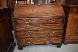 A 19th Century bureau having brass handle and mahogany case with four drawers