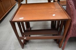 A mid century teak nest of G Plan tables