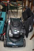 A Spirit 41 Briggs and Stratton petrol lawn mower.