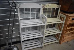 A pair of modern shabby chic shoe or similar racks