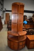 A pair of Mid Century Nathan teak corner wall shelf units