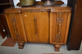 A 20th century Edwardian golden oak side board