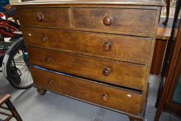 A Victorian set of pine drawers, two over three, having scumbled effect.