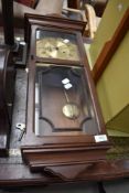 A traditional styled mahogany cased Metamec wall clock.