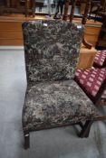 A mahogany framed upholstered dining chair