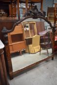 An impressive burr walnut credenza, having mirror back with scrool top detail, foliate inlay to