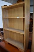 A golden oak bookshelf