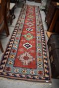 A traditional Kazak style carpet runner