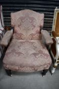 A Victorian stained frame open armchair