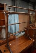 An early 20th century towel rail