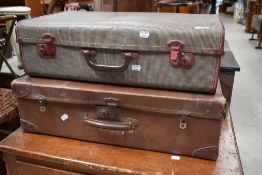 Two vintage suitcases.