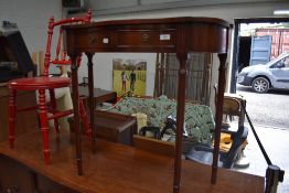 A reproduction Regency side table