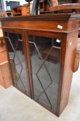A late Victorian mahogany bookcase top having astral glazed doors